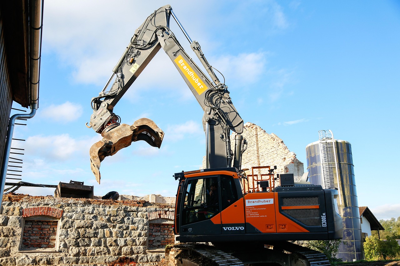 Heavy machinery at Nyara Consults construction site preparing foundations